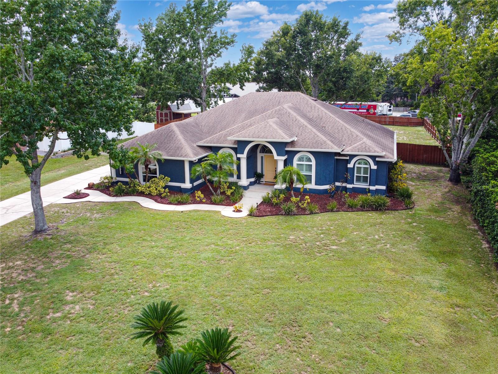 Welcome to this beautifully upgraded home located in a quiet, intimate community of just 21 homes nestled on a cul-de-sac—with NO HOA and deeded lake ownership to a shared lakefront lot! This move-in ready home is packed with features and recent upgrades. All appliances convey with the home, including the refrigerator, gas oven, microwave, dishwasher, washer, dryer, under-cabinet beverage cooler, and built-in wine rack. Interior highlights include custom wood shutters, porcelain tile and laminate flooring, crown molding, and a triple sliding glass door leading to the screened porch. The spacious, fenced backyard is perfect for relaxing or entertaining. The kitchen features new DEKTON countertops, a new sink, new garbage disposal, and a walk-in pantry with cedar shelving. Enjoy the built-in storage and window seating in the formal living room. The primary suite boasts a tray ceiling, walk-in closet, and a fully remodeled bathroom with a freestanding tub, oversized walk-in shower, and modern fixtures. Additional features include: ADT security system Nest thermostat, CO2 sensor, and Ring doorbell Irrigation system (front yard) with new Hunter control system (upgraded June 2025) Oversized 2-car garage with a built in EV charging station, polyurea-coating textured flooring, and a transferable warranty Tankless water heater Major system updates: Propane tank/line (2018) for gas oven and dryer New double-pane windows, sliding glass doors, and front door (April 2020) New drain field (Feb 2021) Upgraded electrical panel with EV charger (April 2022) Don’t miss this rare opportunity to own a thoughtfully upgraded, well-maintained home in a lake-access community—schedule your private showing today!