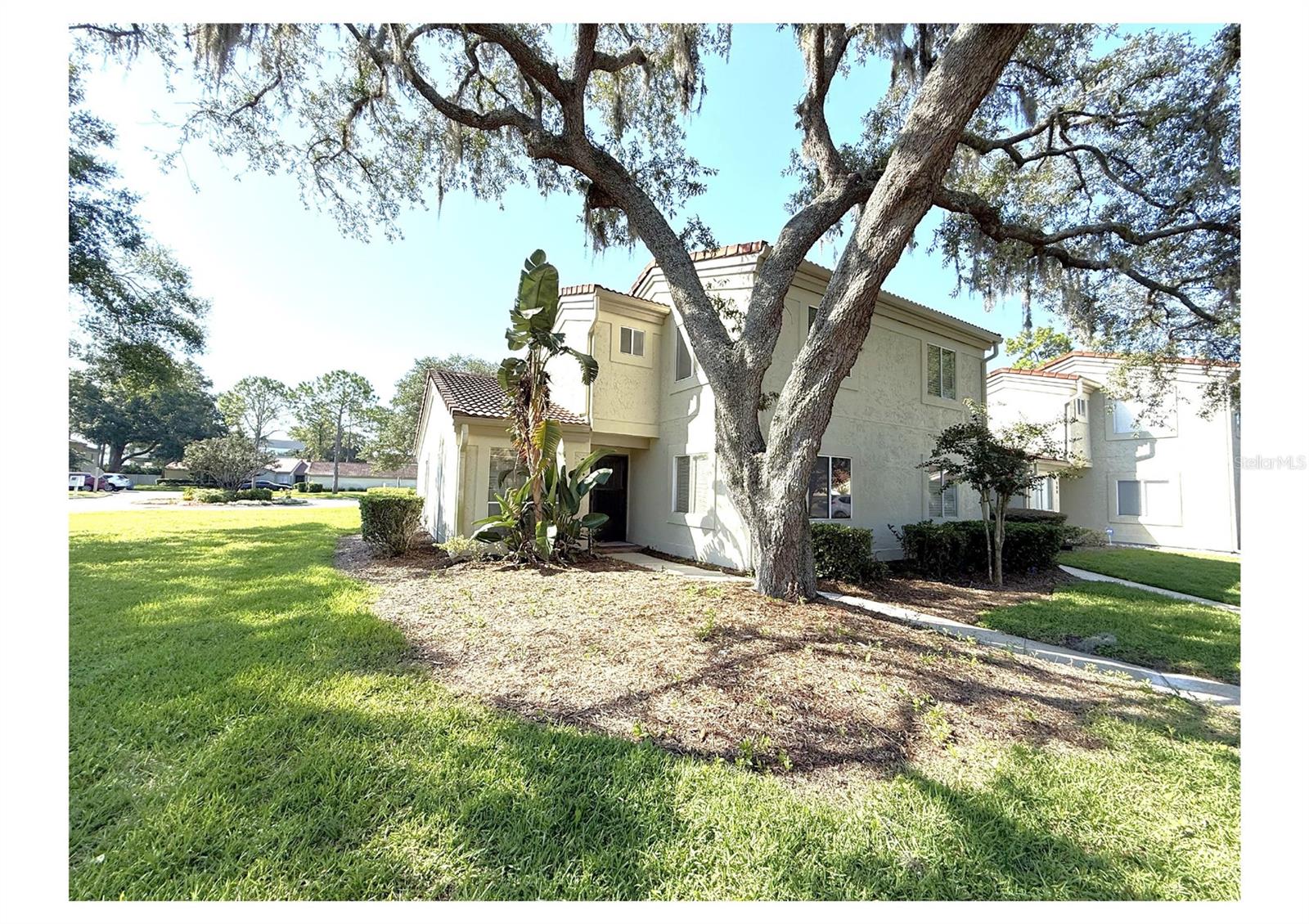 Welcome to San Marco Villas in the charming Sabal Point community!
This 2-bedroom, 2-bathroom, two-story corner unit is tucked away on a beautifully landscaped lot. Step inside to soaring vaulted ceilings in the main living area that create a bright, open feel. Cozy up by the wood-burning fireplace in the living room, or unwind in the peaceful screened lanai overlooking the quiet community.
The primary bedroom is located upstairs for added privacy, while the second bedroom is conveniently downstairs. Ceramic tile runs through the main living spaces, with soft carpeting in the bedrooms. The unit includes an in-home laundry with washer and dryer, and the HOA covers water and landscaping.
Don’t forget to check out the community pool—perfect for relaxing or meeting neighbors!
