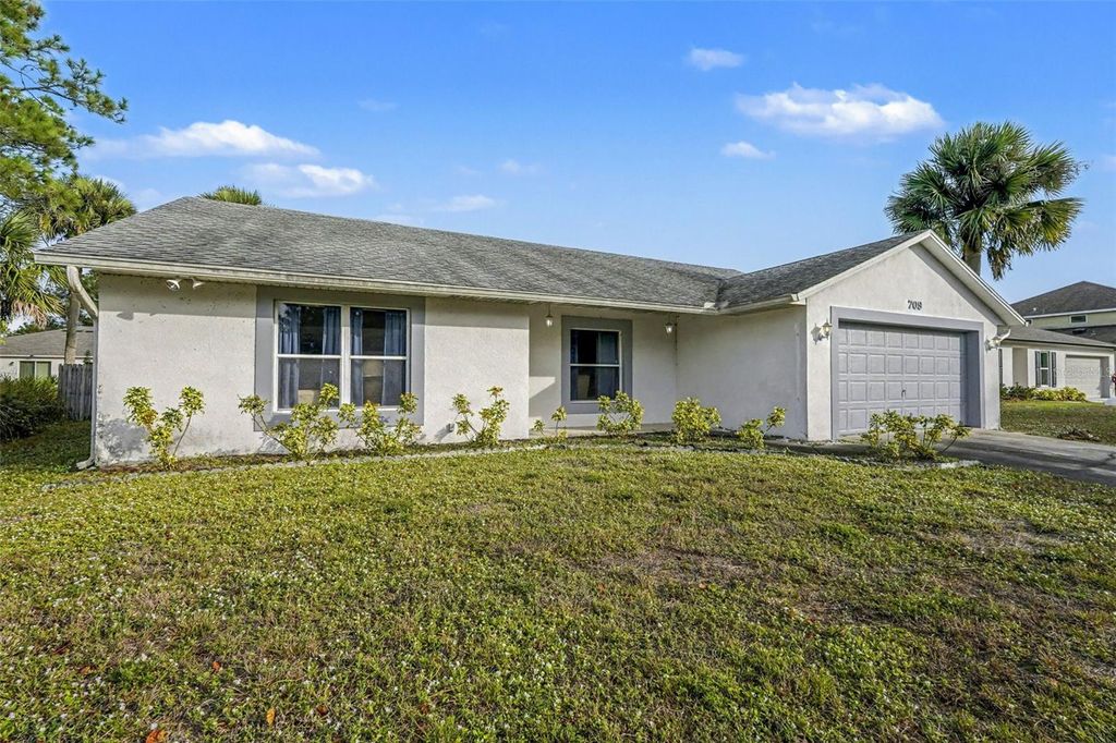 Photo of 709 Haryestor Avenue SW, Palm Bay, FL 32908 (MLS # O6368189)
