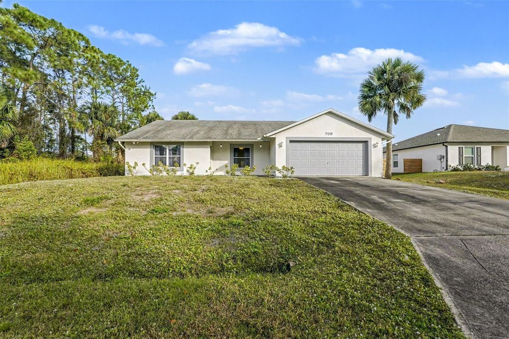 Photo of 709 Haryestor Avenue SW, Palm Bay, FL 32908 (MLS # O6368189)