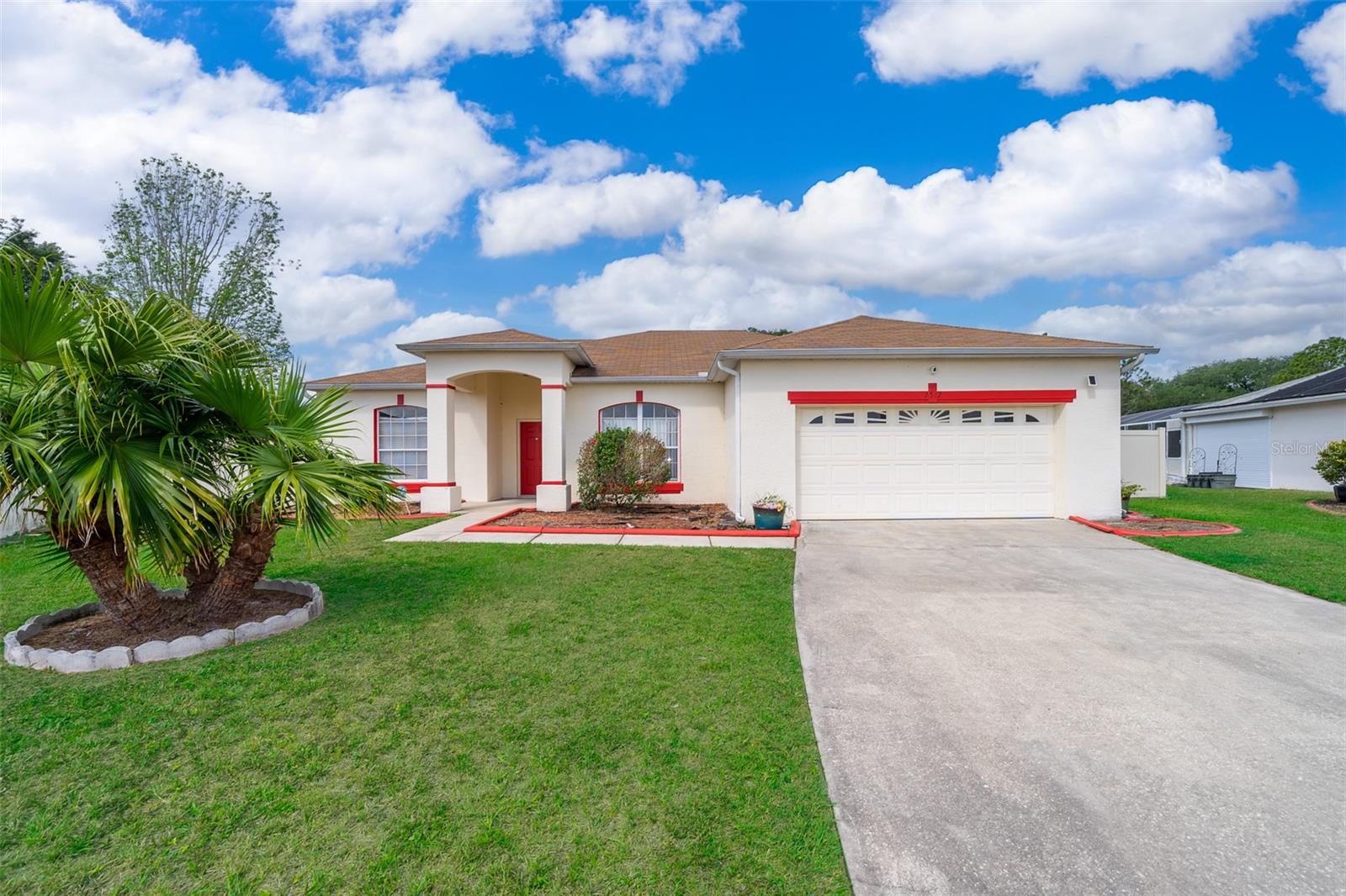 Don't miss out on this beautiful, 4 bedroom, 2 bath, 2 car garage pool home located in the growing city of Kissimmee. This move in ready home features 4 large bedrooms with plenty of closet space, 2 full baths, flooring for bedrooms are carpeted, main living areas are tiled. Split open floor plan offers a spacious living room and separate family room. Enjoy entertaining in your back yard oasis with the help of your in ground pool with screen enclosure. Yard is fenced completely with vinyl fencing. There is ample parking with a long driveway and a 2 car garage! This home will not last on the market, call today for a private showing!