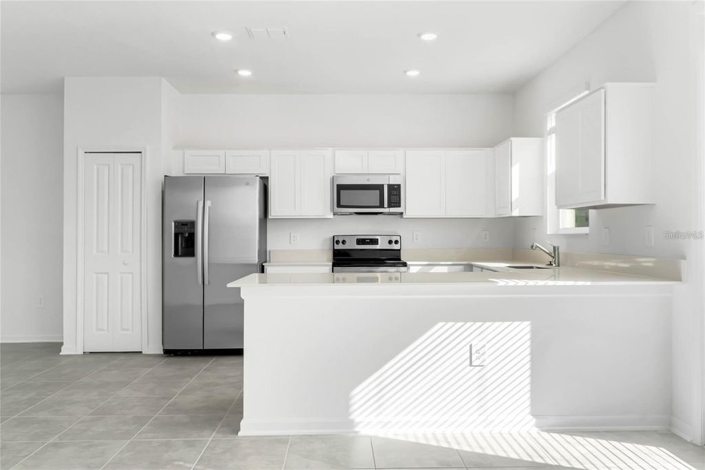 Photo of 353 Bogey Drive, Davenport, FL 33896 (MLS # O6403629)