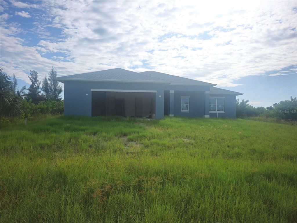 Photo of 10056 St Paul Drive, Port Charlotte, FL 33981 (MLS # C7515685)