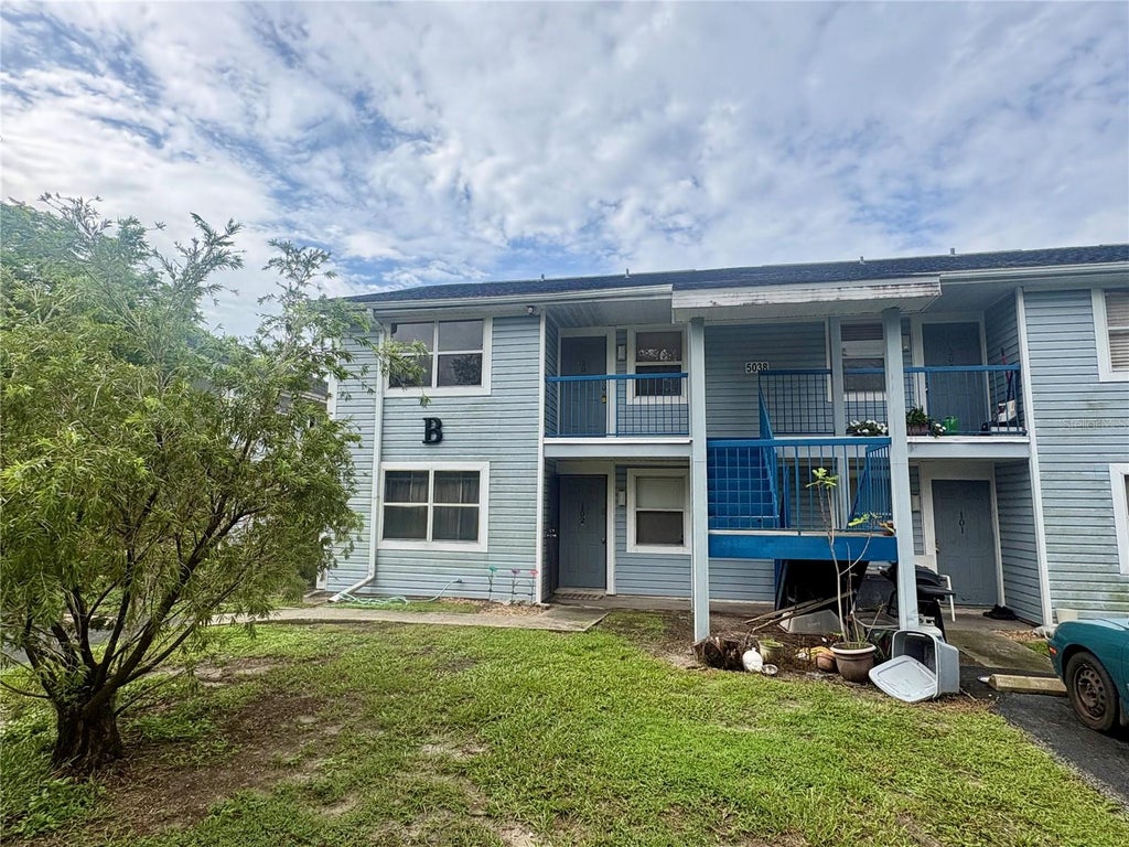 Photo of 5038 Terrace Palms Circle #202, Tampa, FL 33617 (MLS # TB8535376)