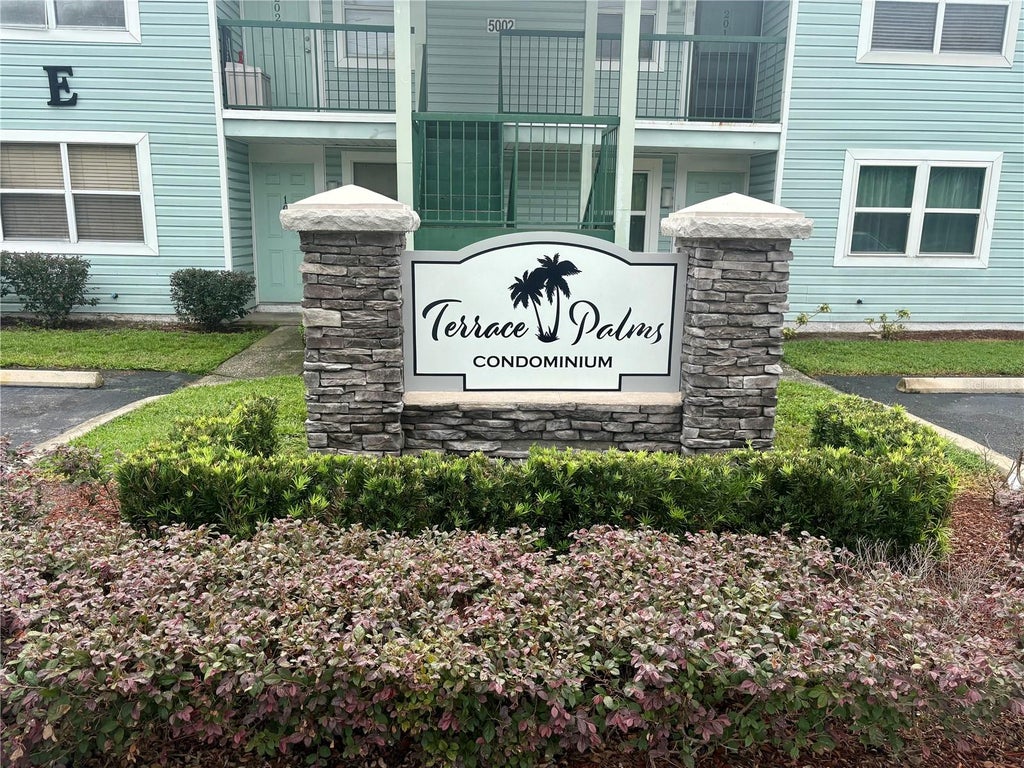 Photo of 5038 Terrace Palms Circle #202, Tampa, FL 33617 (MLS # TB8535376)