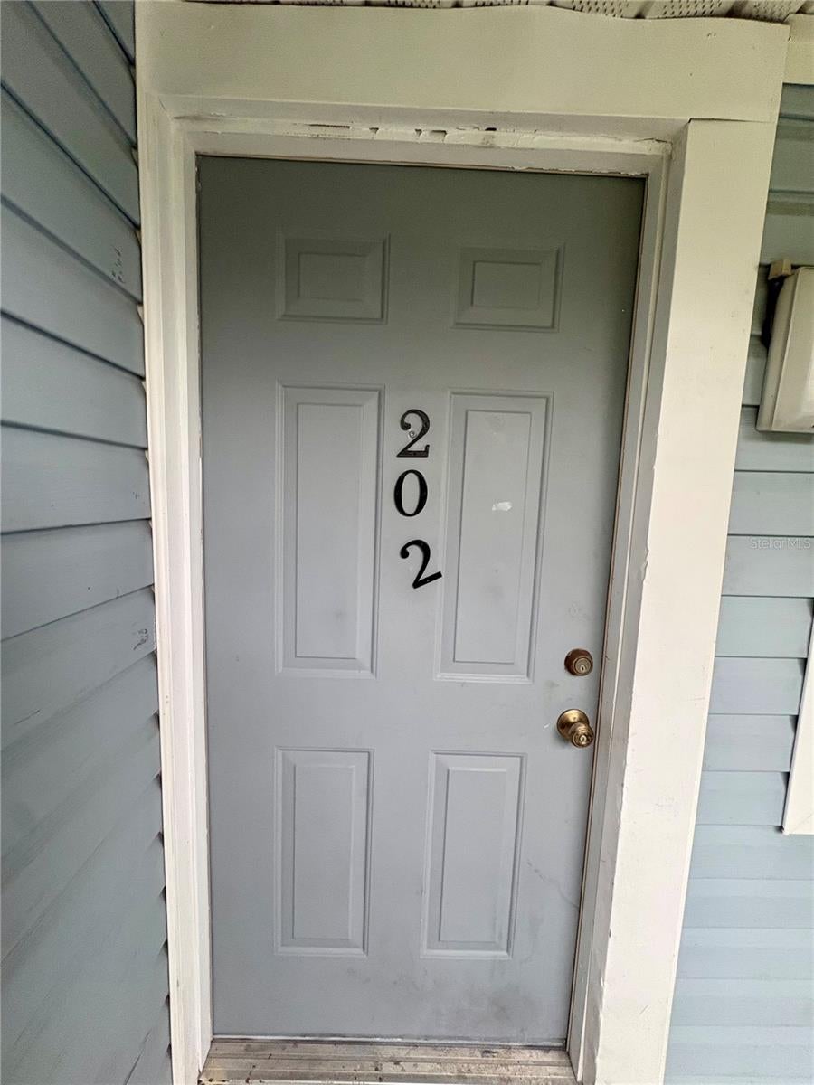 Photo of 5038 Terrace Palms Circle #202, Tampa, FL 33617 (MLS # TB8535376)