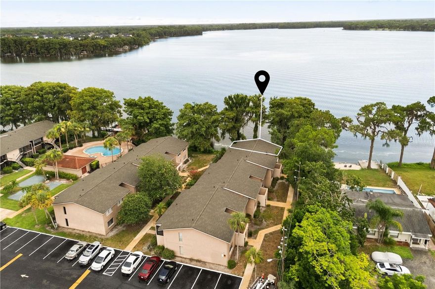 Wake up to breathtaking water views at 1175 Paseo Del Mar, Unit A. This beautifully renovated first-floor WATER FRONT condo features one large bedroom bedroom, one bathroom, and one of the most coveted waterfront views in the community. From sunrise mornings with coffee in your sleek modern kitchen to peaceful evenings watching the water right from your oversized bedroom, this home is designed for everyday serenity. There really isn't not a better location in this community. 

The interior showcases a light-filled layout with stylish finishes and a fresh, contemporary design. Just off the dining space, step into your private screened-in patio overlooking the lake, the perfect spot to relax and unwind. Conveniently included in the home is a washer and dryer, making everyday living even more effortless.

Step outside and enjoy the true waterfront lifestyle with community amenities including a private boat ramp, fishing dock, sparkling pool, and clubhouse. Whether you’re searching for a year-round residence or a weekend retreat, this condo offers comfort, convenience, and unbeatable views in a prime location. You can even store your boat or jetski on site. 

Owner financing may be assumable with the appropriate down payment; inquire for full loan terms.