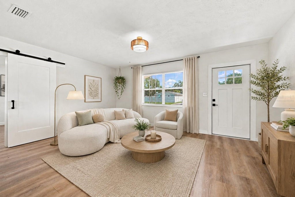 Photo of 933 41st Avenue NE, St Petersburg, FL 33703 (MLS # TB8539092)