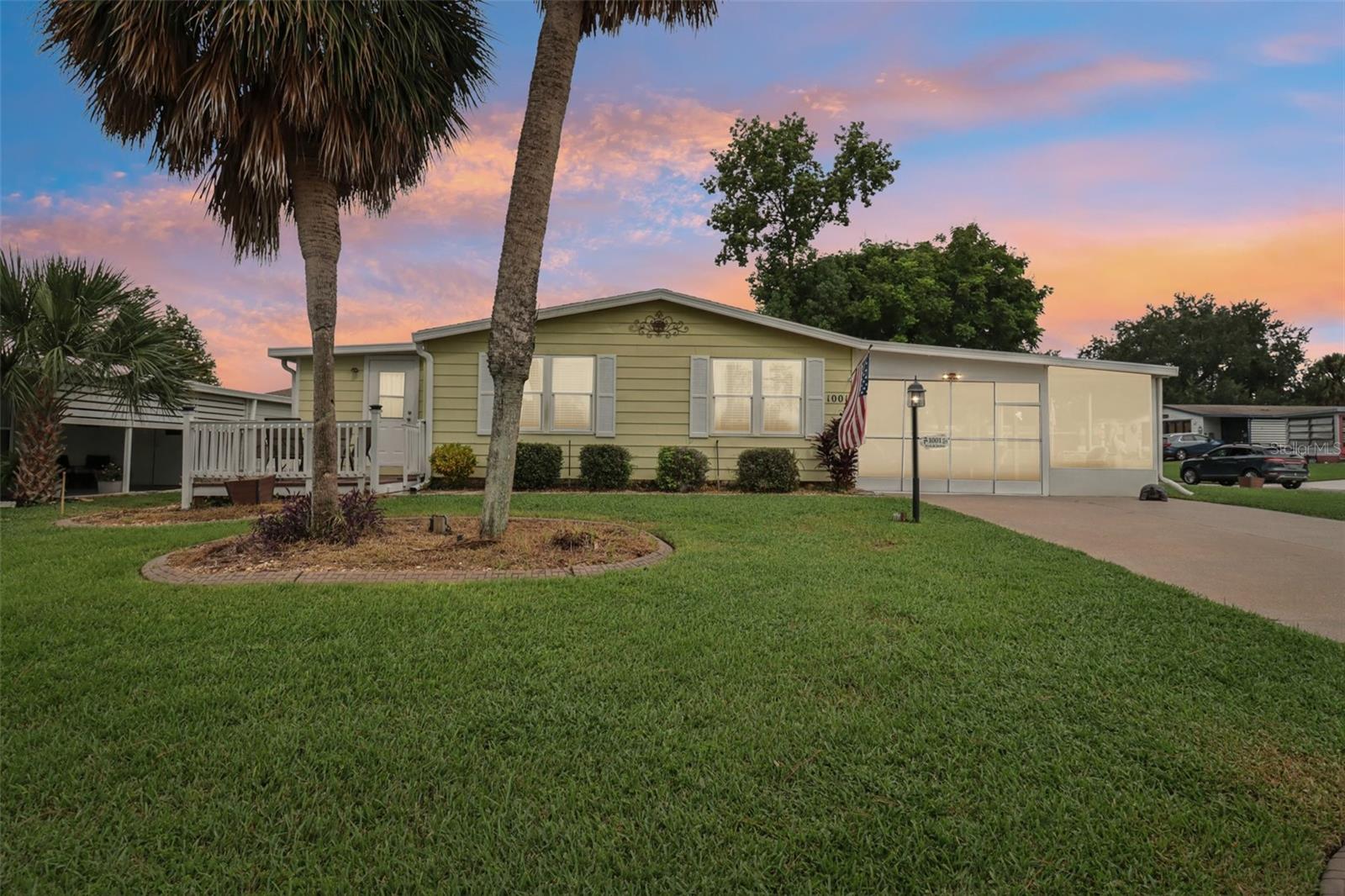 Come see this ADORABLE cottage-like home that is loaded with updates and move-in ready with QUICK ENTRANCE/EXIT at Shay OR Jeffrey Gate! Sitting on a desirable CORNER LOT, it offers both charm and modern convenience. Highlights & Recent Updates: NEW Roof Coming soon; A/C (2020); Water Heater (2025); LG Washer & Dryer (2024); NEUTRAL-TONED Luxury Vinyl Plank flooring (2023) throughout; UPDATED Kitchen w/island and GRANITE countertops (2025); SS appliances: KENMORE refrigerator & cooktop, and GE microwave (2021). UPDATED Bathrooms (2024): UPDATED master bath w/walk-in shower AND guest bath with tub & shower. There is a BONUS ROOM/DEN (11x9) off of the living room perfect for an office, hobby, or extra living space. Vinyl windows (except kitchen) & chair rail detail throughout. The UNDER ROOF/SCREENED-IN carport (2022) has durable, slip-resistant Chattahoochee flooring for easy outdoor living and maintenance. There is an outside laundry/storage area (10x13) w/built-in shelving and walk-through to attached Golf Cart Garage (9x10) - both insulated, drywalled, w/locking double doors & entry ramp on the golf cart garage. There is an additional durable storage shed outside for any additional storage needs. There are TWO 4-car driveways (south & west side) providing plenty of parking for guests, toys, or multiple vehicles. This home blends classic charm with modern updates, offering flexibility and plenty of space both inside and out.