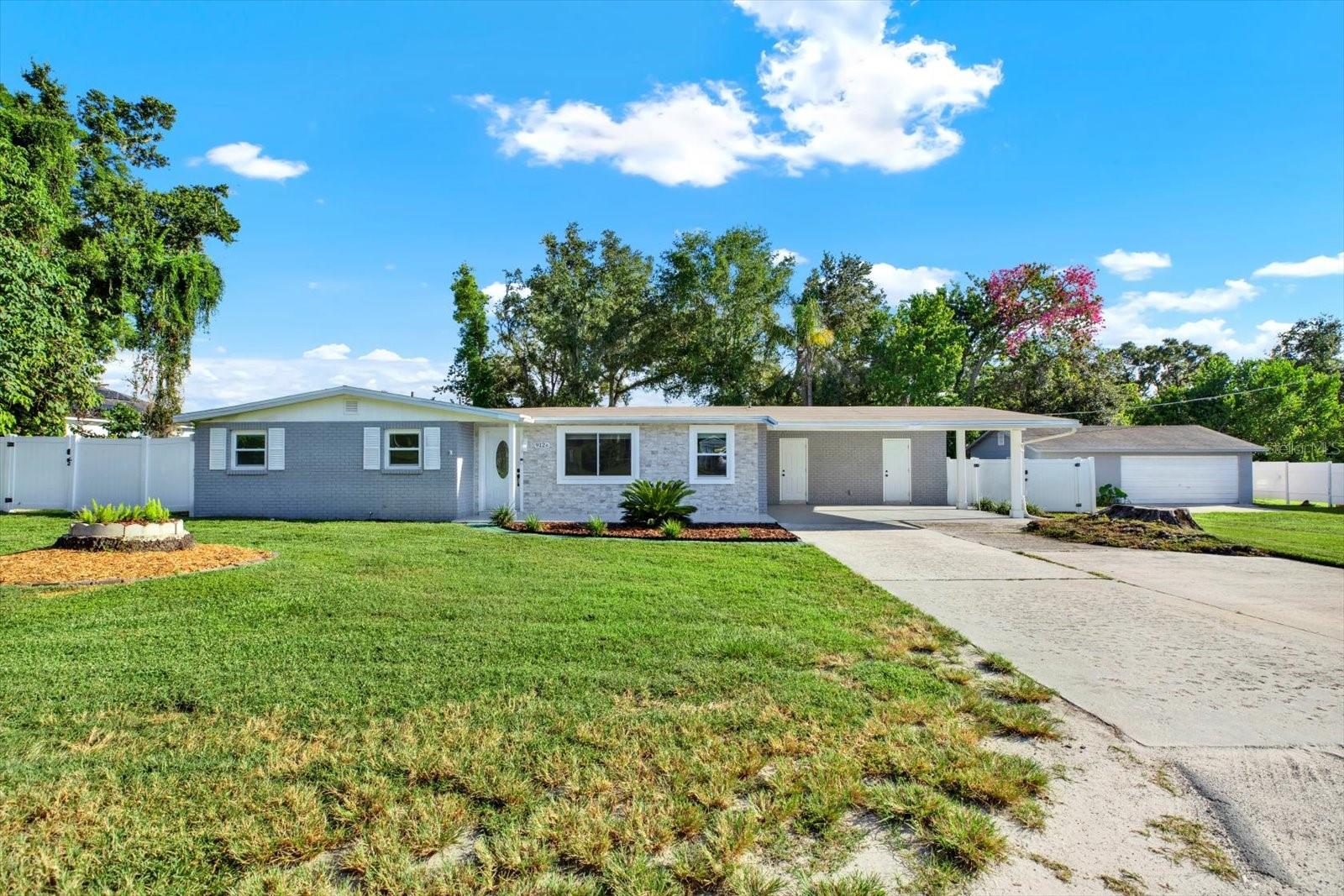 Beautiful Single-Family Home! Welcome to this spacious 4-bedroom, 2-bathroom home set on over half an acre of land in Brandon! With vinyl flooring throughout, the interior offers a clean and modern feel. The expansive lot extends beyond the fence on the left side of the home, providing plenty of room for outdoor living. In addition to the main residence, the property includes a detached 2-bedroom, 1-bathroom ADU—perfect for extended family, guests, or rental income.Recent upgrades add peace of mind, including a new plastic septic and drain field system (2021) and a new well pump (2025). The home has also been freshly painted inside and pressure washed outside. For relaxation and fun, the above-ground pool is ready for those hot Florida summers. With its generous lot size, this property offers ample space for your furniture, recreational vehicles, and more. This home is ideal for buyers who value both comfort and the tranquility of wide-open yard space.