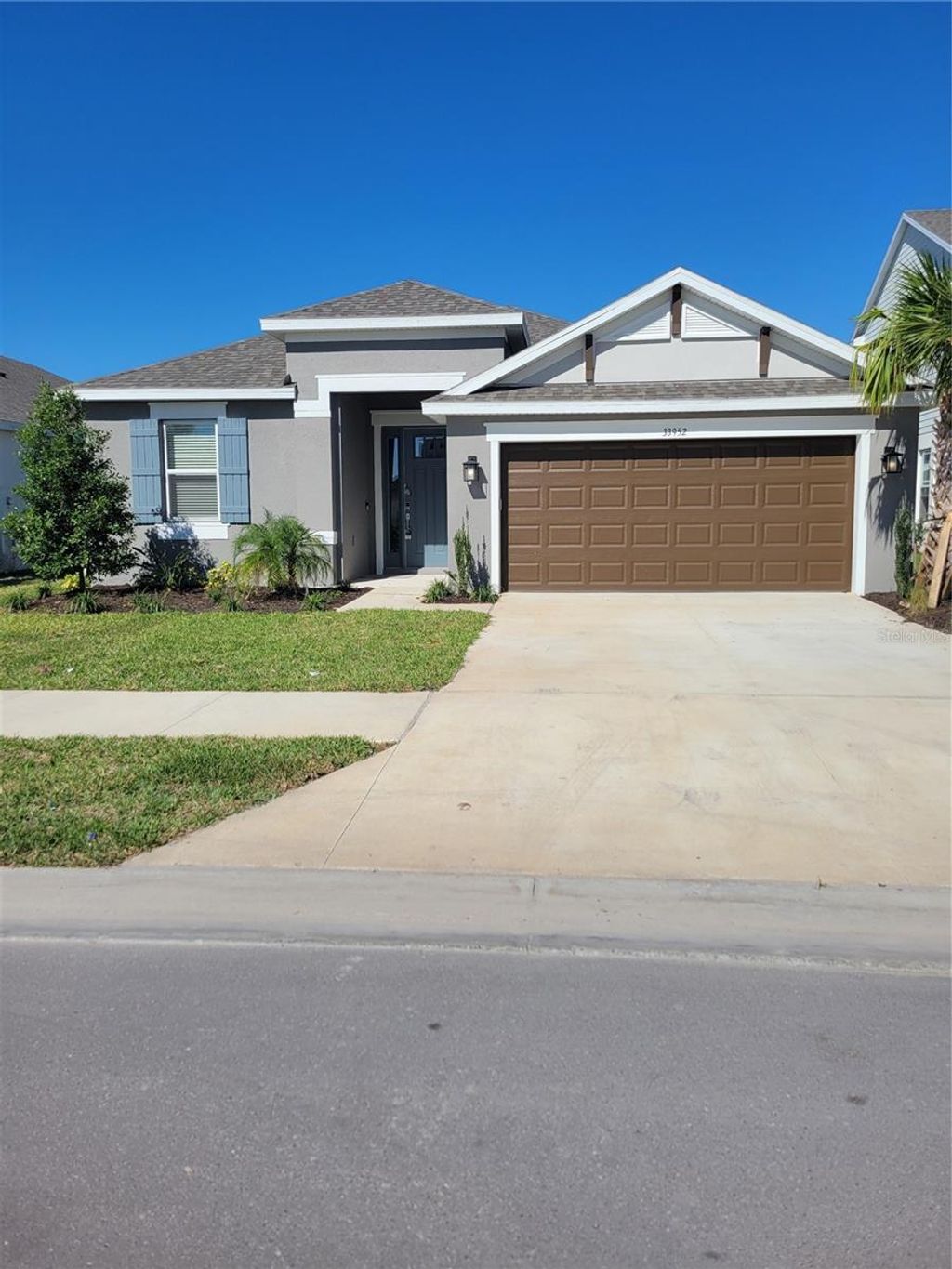 Photo of 33952 Landsman Loop, Wesley Chapel, FL 33543 (MLS # J983712)