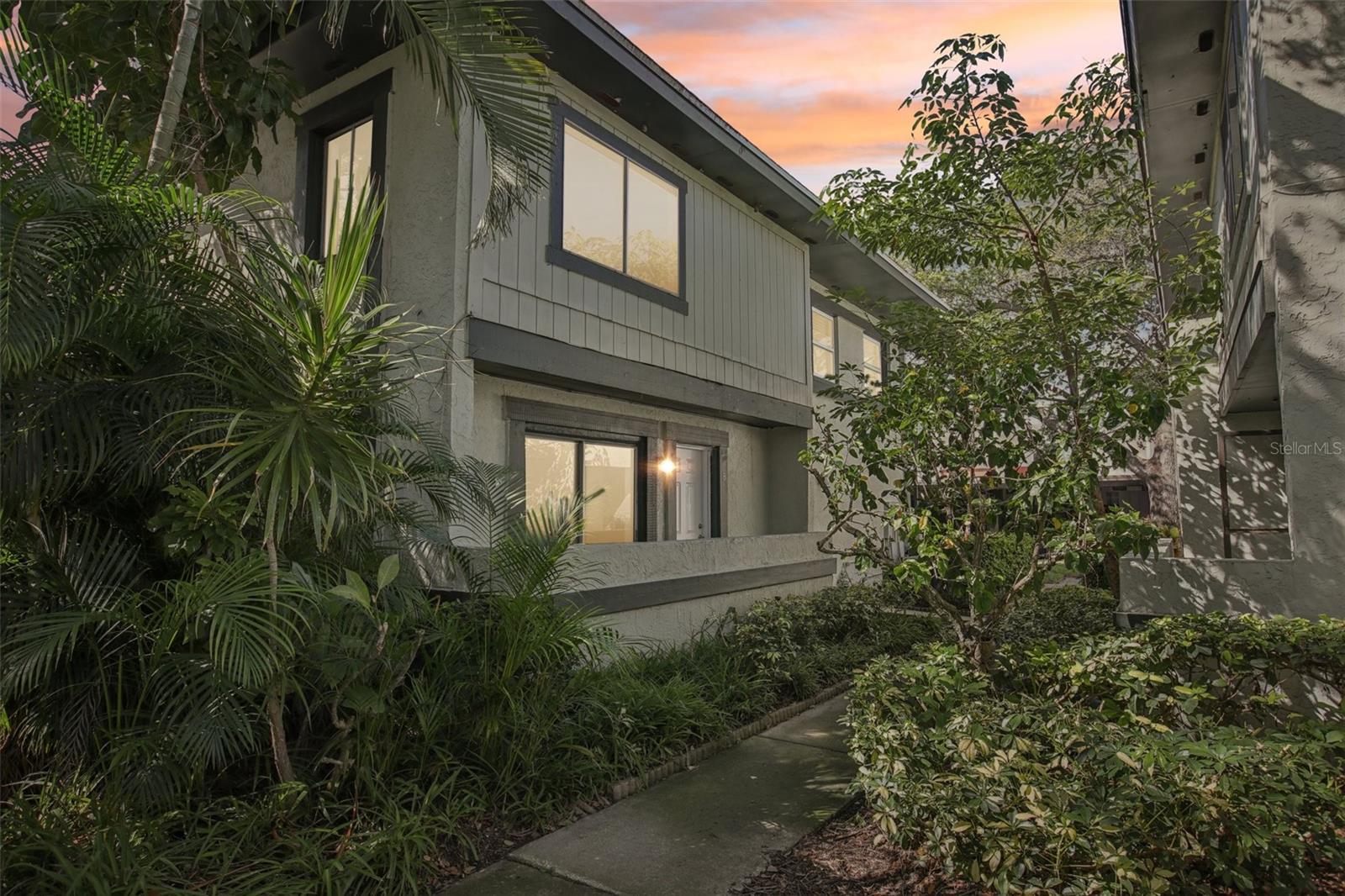 Stunning Fully Remodeled Townhouse in Eastwood Shores! This beautifully renovated 2BR/2BA home combines modern style, low-maintenance living, and an unbeatable Clearwater location just minutes from Tampa Bay and award-winning beaches. From the moment you enter, you’ll be impressed by the open-concept layout with soaring vaulted ceilings, abundant natural light, and fresh neutral paint that makes the home feel bright and inviting. The main living area has been upgraded with luxury vinyl plank flooring for both elegance and durability, while modern trim and finishes give the home a fresh, cohesive look. The gourmet kitchen is a true highlight, featuring brand-new stainless-steel appliances, quartz countertops, sleek cabinetry with soft-close doors, and under-cabinet lighting that adds both function and style. Sliding glass doors lead directly from the kitchen to your private patio, creating the perfect flow for morning coffee, outdoor dining, or entertaining with friends. Upstairs, you’ll find two spacious bedrooms with plush carpet, ample closet space, and an updated full bathroom designed with contemporary fixtures, designer tile, and a modern vanity. Additional upgrades include a 1-car garage with brand-new epoxy flooring, a convenient laundry area, and impact-resistant windows and sliding doors throughout the home for energy efficiency and peace of mind. The roof is maintained by the HOA and the A/C is less than 5 years old, offering long-term savings and confidence in your investment.
Living in Eastwood Shores means enjoying a carefree lifestyle with HOA services that cover water, sewer, trash, exterior insurance, and landscaping. Residents also have access to outstanding amenities, including a sparkling community pool, tennis courts, fishing dock, and scenic walking trails. The community is pet-friendly and beautifully maintained, providing a welcoming environment for all. This townhouse is ideally located near major highways for an easy commute, as well as shopping, dining, entertainment, and healthcare facilities. Whether you’re a first-time buyer, seasonal resident, or investor looking for a strong rental opportunity, this property offers the perfect combination of comfort, convenience, and modern design. This property’s location combines the best of waterfront living, community amenities, and convenient access to urban essentials. Its proximity to shopping, dining, entertainment, and major transportation routes makes it ideal for a vibrant, active lifestyle. The area’s natural beauty, safety, and growth prospects further enhance its appeal, making it an excellent choice for families, professionals, and retirees seeking a peaceful yet connected community.