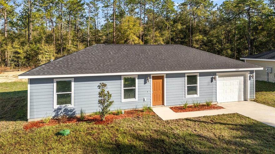 Country living at its finest! New home on an undeveloped road. Welcome to this brand-new “Aleida” model by Bakan Homes, with 1,058 square feet of living space, this charming wood-frame home is designed to offer modern comforts at an accessible price point. Step inside to discover an open-concept living area featuring waterproof vinyl-plank flooring in the social spaces and plush carpet in the bedrooms. The stylish L-shaped kitchen features sleek quartz countertops and stainless-steel appliances, including a dishwasher. Enjoy the contemporary touch of LED pendant lighting in the dining area, adding a touch of elegance to the space. Located in a growing community, this home offers the perfect combination of affordability, modern finishes, and convenience. Don’t miss the opportunity to own this new construction home in Ocala—perfect for first-time buyers or those looking to downsize. Your investment is protected by a limited Builder Warranty that expires 1 year after the issuance of the Certificate of Occupancy.  Pictures are of a recently completed model. Colors, finishes, and appliances may vary from home to home. This model does not include a garage door opener. Estimated completion dates are only estimates and may be delayed due to unforeseen circumstances.