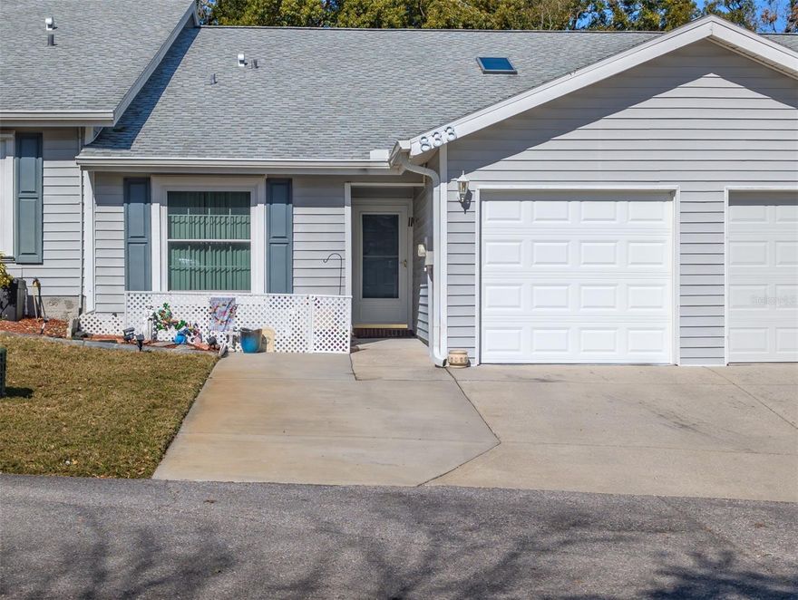 HONEY STOP THE CAR!!!!!Welcome to your dream retreat in beautiful Tarpon Springs, nestled in Northern Pinellas County just moments from A.L. Anderson Park and the sparkling waters of Lake Tarpon. This updated 3-bedroom, 2 full bathroom villa with 1 car garage  blends modern living with Florida charm — offering the perfect balance of comfort, style, and convenience. NEW kitchen, floors, painted interior, doors, trim, floors, pave red patio, enclosed all weather back patio...... No more yard to mow! The HOA fee covers the WATER, SEWER,GARBAGE, CABLE, INTERNET, HEATED INDOOR POOL, EXTERIOR OF THE BUILDING, ROOF, LAWN MOWING !!! This home is located in a peaceful low traffic setting and is PET FRIENDLY.  No age restrictions. Can rent right away. This beauty is turn key ready for its new owner... Call for your private showing.High and dry, out of the flood zone. A safe haven during recent inclement weather conditions in Florida. Solid construction, extremely well maintained building.  And the HOA has sufficient reserves. The community passed all Florida required inspections with flying colors.