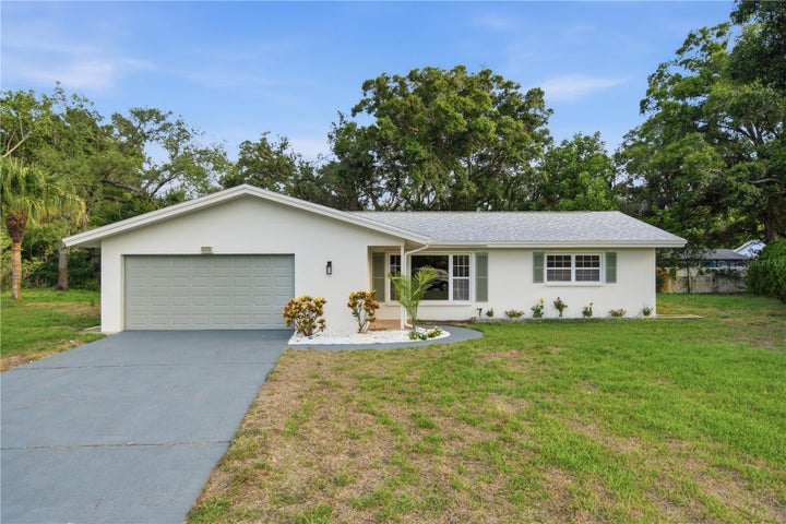 Photo 1 of 40 — 1920 CANADIANA COURT, DUNEDIN, FL 34698
