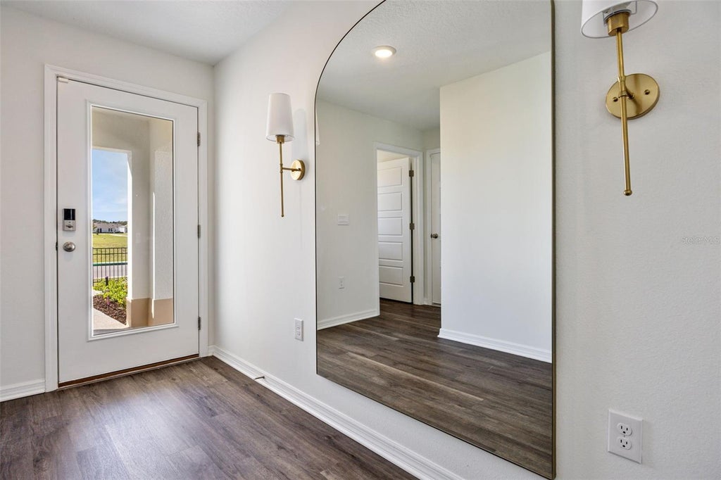 Photo of 4019 Limeklin Falls Loop, Davenport, FL 33837 (MLS # O6430440)
