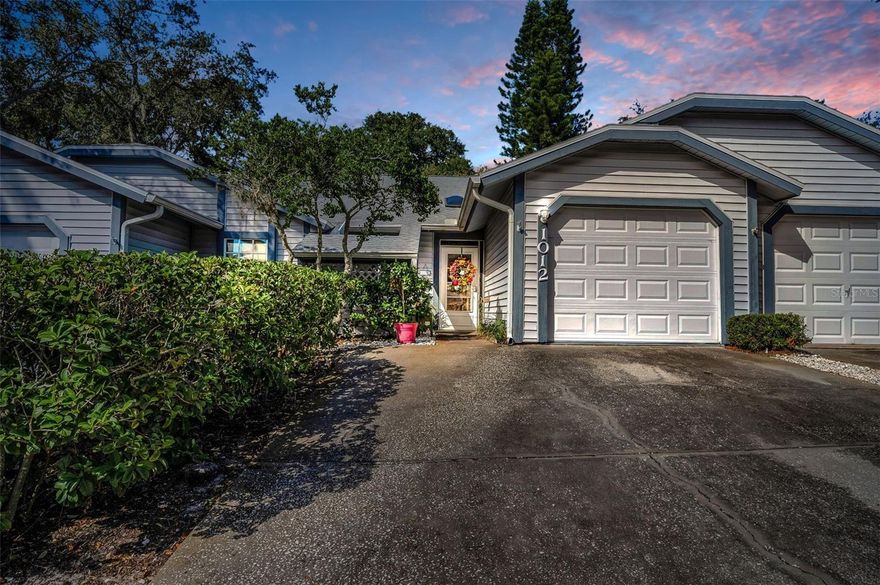 Updated 2-Bedroom Villa in Prime Tarpon Springs Location – Modern Comfort Meets Coastal Living! Welcome to your dream retreat in beautiful Tarpon Springs, nestled in Northern Pinellas County just moments from A.L. Anderson Park and the sparkling waters of Lake Tarpon. This updated 2-bedroom, 2 full bathroom villa blends modern living with Florida charm — offering the perfect balance of comfort, style, and convenience.Step inside through the enclosed breezeway connecting your private one-car garage to the main living space — a rare and thoughtful feature providing both functionality and curb appeal. Inside, the heart of the home is a modern kitchen that impresses with granite countertops, stainless steel appliances, and an abundance of wood cabinetry — ideal for cooking, entertaining, and everyday living. The kitchen overlooks the expansive Great Room with high vaulted ceilings, where living and dining areas combine to create a bright and welcoming space for gathering and relaxing. Enjoy year-round sunshine in the fully enclosed Florida room (currently utilized as a home office space), offering tranquil views of your fenced backyard and cozy patio — perfect for relaxation or entertaining --- or playing with your “furbabies”!!  Both bedrooms are generously sized, and the two full bathrooms have been thoughtfully updated to reflect today’s modern tastes. The community amenities include a clubhouse, pool and fitness room and the monthly fees include water/sewer/trash removal, exterior and roof maintenance and as well as internet, cable TV, and exterior pest control.  Situated just minutes from top local attractions, you’ll be close to the boating, hiking, and picnic opportunities at Lake Tarpon and A.L. Anderson Park, with the white sands of Fred Howard Park and Sunset Beach only a short drive away. Enjoy the convenience of nearby shopping, dining, and entertainment. Whether you're looking for a full-time residence or seasonal getaway, this villa is a must-see for those who crave style, location, and the Florida lifestyle.