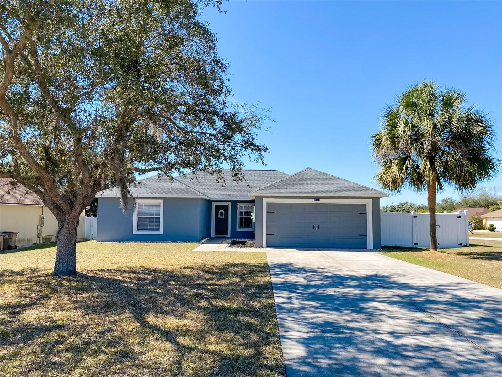 You absolutely do not want to miss the opportunity to call this RENOVATED FOUR BEDROOM PET FRIENDLY FULLY FENCED CORNER LOT house your home! Every single room features updated ceiling fans and light fixtures, cordless blinds, custom closets with walk/built in closets, laminate flooring throughout the whole house. Extra cabinets installed for kitchen storage, and stainless steel appliances and Washer and Dryer (2021) included. The home is situated just under a quarter acre corner lot, with a fully fenced backyard and side yard with a white vinyl 6 foot privacy fence. Spend these summer nights sitting around the backyard FIREPIT, Or, have a picnic on the fresh turf installed as a play area for outdoor entertaining and lawn games. Back patio includes a pergola frame mounted into the concrete with cover for shade! You will have fruit bearing trees to pick every season, including a Mandarin Orange Tree, Tangelo Tree and a Loquat Tree. Long driveway can hold multiple cars. Home is pet friendly and most breeds are accepted. Please inquire directly whether HOA or insurance has any restrictions based on breed.
