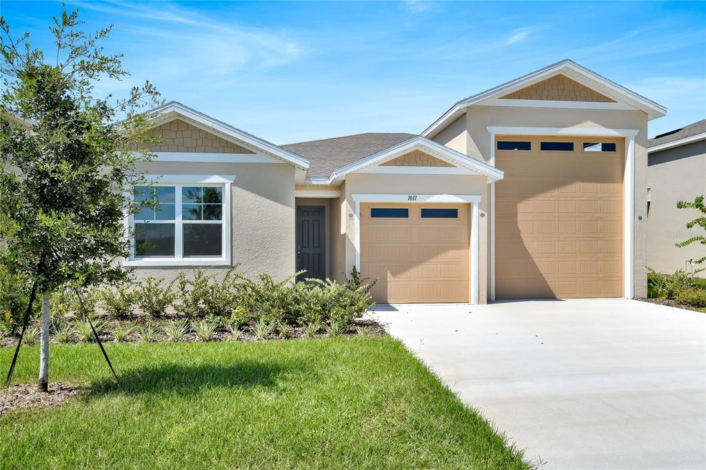 Photo of 1011 Wisteria Way, Dundee, FL 33838 (MLS # S5160516)