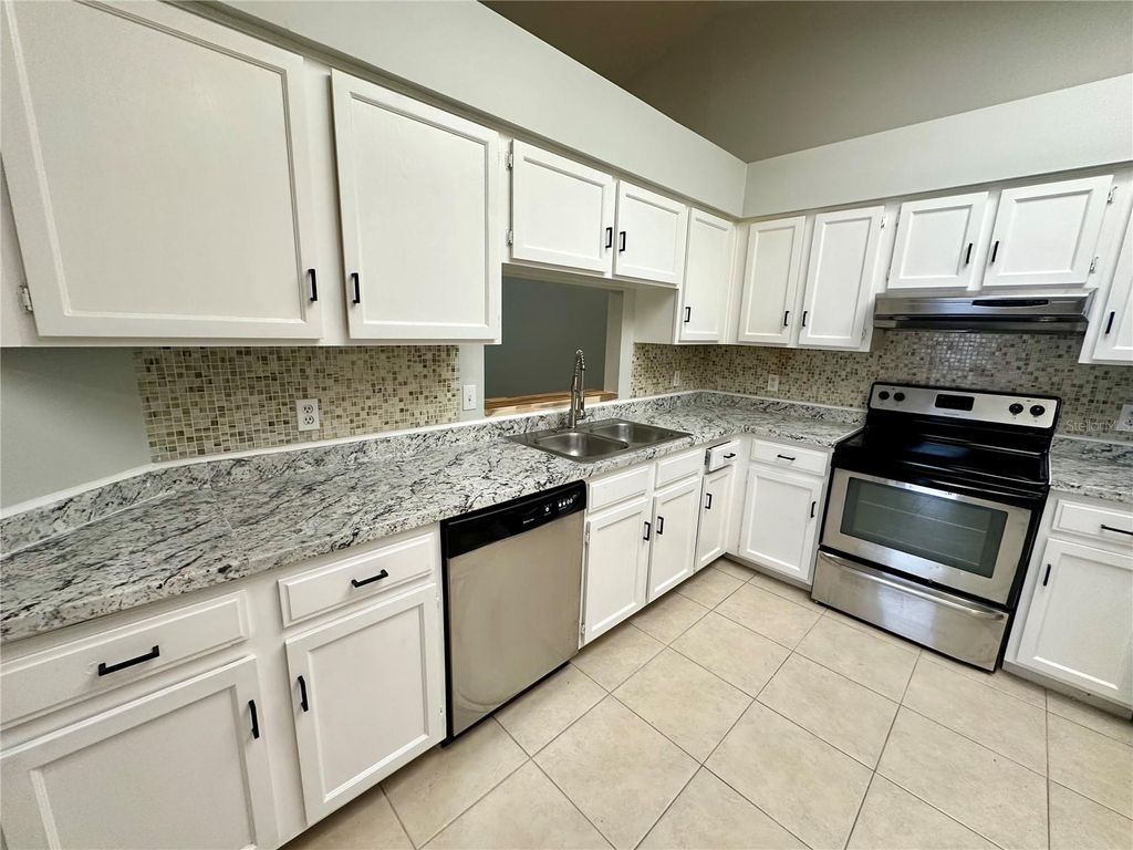 Photo of 2510 Long Meadow Way, Orlando, FL 32817 (MLS # O6372228)