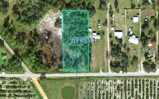 Welcome to your future oasis in Polk County, where this expansive 1.62-acre lot awaits your vision for a dream home. This property is perfectly situated within a community of well-established homes, with electrical access just moments away, offering you the ideal foundation for either a custom build or a manufactured home. Embrace the tranquil rural charm while enjoying the convenience of nearby Highway 27, ensuring effortless travel throughout Florida. With no flood zone concerns and the flexibility to install your own well and septic system, this prime lot is ready for your unique touch, making it a blank canvas for your aspirations.