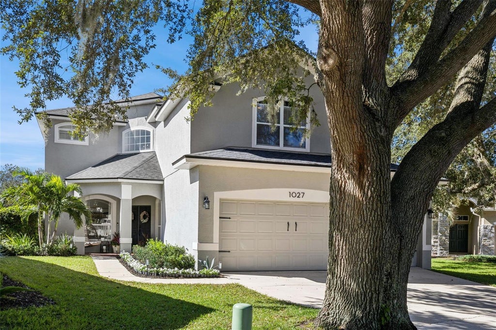 Photo of 1027 Ridgemount Place, Lake Mary, FL 32746 (MLS # O6452650)