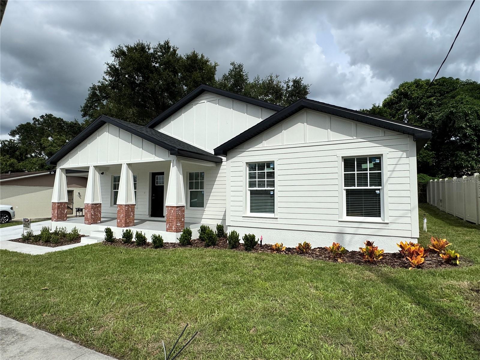 Welcome to this brand-new Craftsman-style home in the heart of Lakeland’s historic Dixieland neighborhood. Thoughtfully designed to blend timeless architecture with modern efficiency, this 3-bedroom, 2-bath residence offers the charm of a classic bungalow with the peace of mind of new construction.
Built with solid block construction and Hardy board siding, the home is as durable as it is beautiful. Inside, you’ll find luxury vinyl plank flooring, elegant 8-inch baseboards, and custom tile showers that bring both style and comfort to everyday living. Large windows provide plenty of natural light.
Energy efficiency is at the forefront, with spray foam insulation and high-performance systems that help keep utility costs low.
Step outside and you’re just moments from the shops, restaurants, and community vibe that make Dixieland one of Lakeland’s most sought-after neighborhoods.
Highlights:
Brand-new 3 bed / 2 bath Craftsman design
Block construction with Hardy board siding
Luxury vinyl plank flooring & 8" baseboards
Tile showers with upgraded finishes
Spray foam insulation & high efficiency features
Located in Lakeland’s historic Dixieland neighborhood