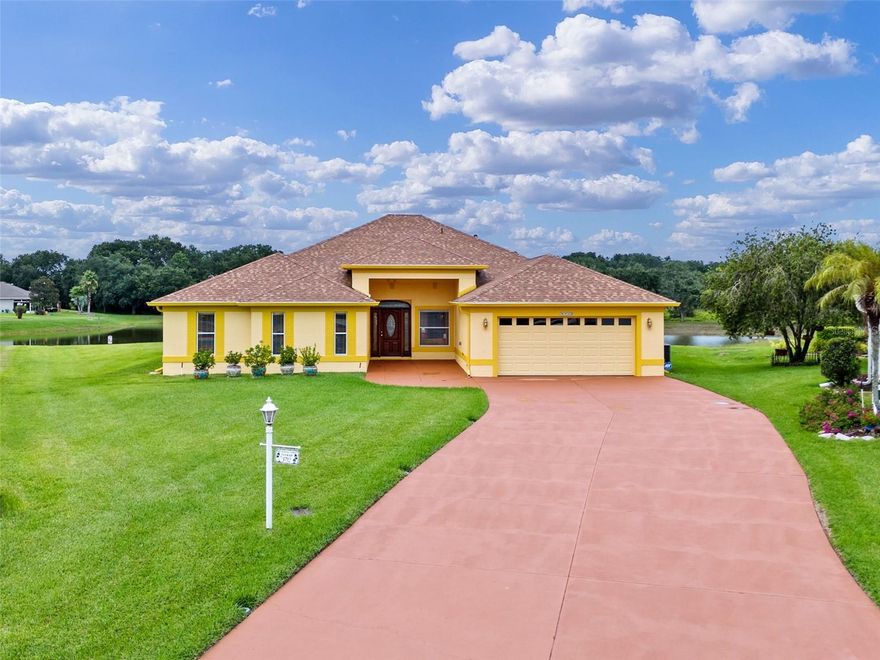 Assumable VA Loan with an interest Rate of 2.75%. This charming home offers a stunning water view, situated on a cul-de-sac with tons of a privacy within the gated community of The Plantation. Featuring 3 bedrooms, 2.5 bathrooms, and a Florida room with panoramic pond and conservation views, it’s perfect for relaxation and entertaining. The interior boasts natural light, high ceilings, crown molding, custom fixtures, and extensive porcelain tile and wood floors.  There are two master suites and the primary master suite also features beautiful views and a spacious master bathroom with a large shower and his and hers sinks.   The open kitchen with 42 inch cabinets, Corian counters, island, and built-in seating connects to a spacious dining area with water views. Ample closet space with custom shelving has been added to all the bedrooms, low-maintenance landscaping, and recent upgrades like a new roof (2022) and AC (2016) and freshly painted inside and out add to its appeal. Enjoy resort-style amenities including golf, pools, fitness centers, restaurant, tennis courts and pickleball courts and social activities in this award-winning community. The Plantation at Leesburg received the Best of 2025 Retirement community award.  Optional furnished sale available.   or ask about our financing incentive with our preferred lender.