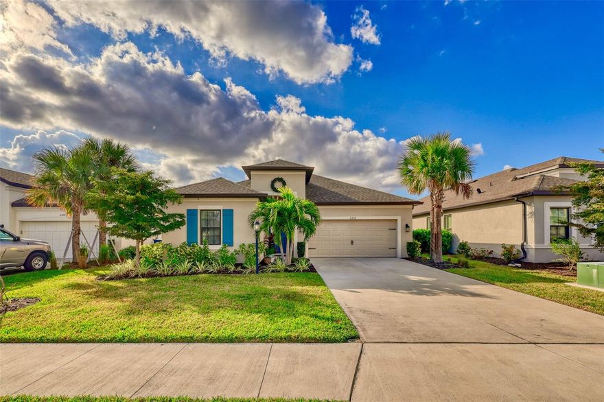 Welcome to this beautifully upgraded 4-bedroom, 3-bath home in the gated community of Grandview at The Heights in Bradenton. Built in 2022, this thoughtfully designed residence offers 2,380 sq. ft. of open-concept living space with stylish modern finishes and peaceful water views.

The gourmet kitchen is the heart of the home, featuring quartz countertops, GE Profile built-in gas appliances, a walk-in pantry, butler’s pantry, and designer backsplash details. The spacious layout includes a versatile formal dining room that can easily function as a private office or flex space. Premium upgrades throughout include wood-look laminate flooring, crown molding, tray ceilings, 8-foot interior doors, upgraded lighting and fans, motorized shades, and a screened paver lanai overlooking the pond.

The owner’s suite offers a luxurious retreat with dual vanities, a garden tub, frameless glass shower, and large walk-in closet. Additional features include natural gas, hurricane shutters, rain gutters, and spacious 2-car garage

Residents enjoy resort-style amenities including a community pool, kayak launch into Ward Lake, dog park, basketball courts, playground, and scenic walking trails. Conveniently located near UTC shopping and dining, downtown Sarasota, Lakewood Ranch, SRQ Airport, and Florida’s award-winning Gulf beaches.