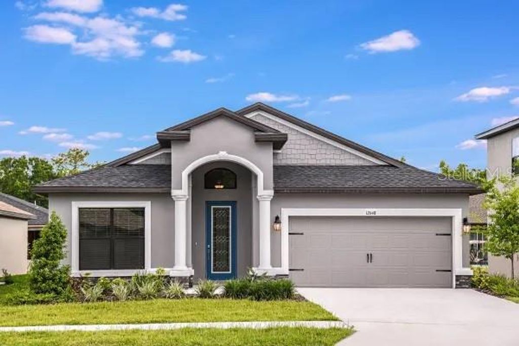 Photo of 12648 SOURWOOD WAY, NEW PORT RICHEY, FL 34654 (MLS # W7852570)