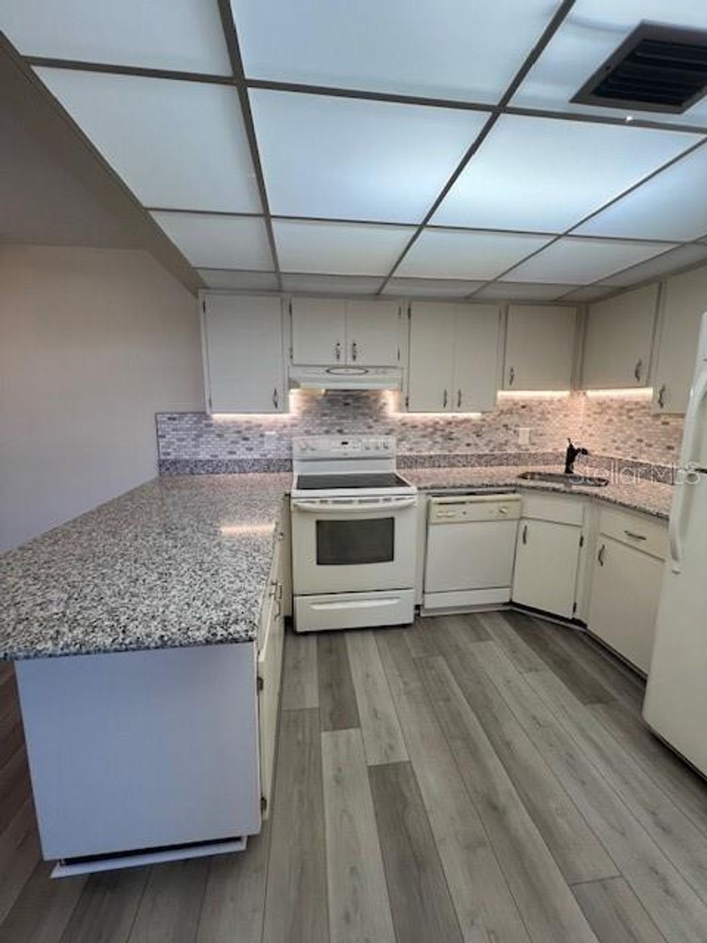 Photo of 21260 Brinson Avenue #211, Port Charlotte, FL 33952 (MLS # C7516934)