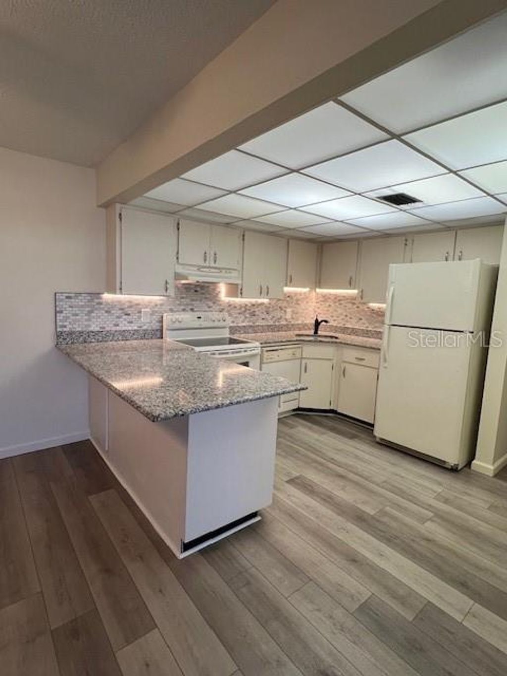 Photo of 21260 Brinson Avenue #211, Port Charlotte, FL 33952 (MLS # C7516934)