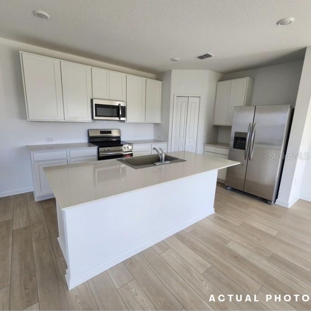 Photo of 6432 Domizio Drive, Winter Haven, FL 33884 (MLS # O6376359)