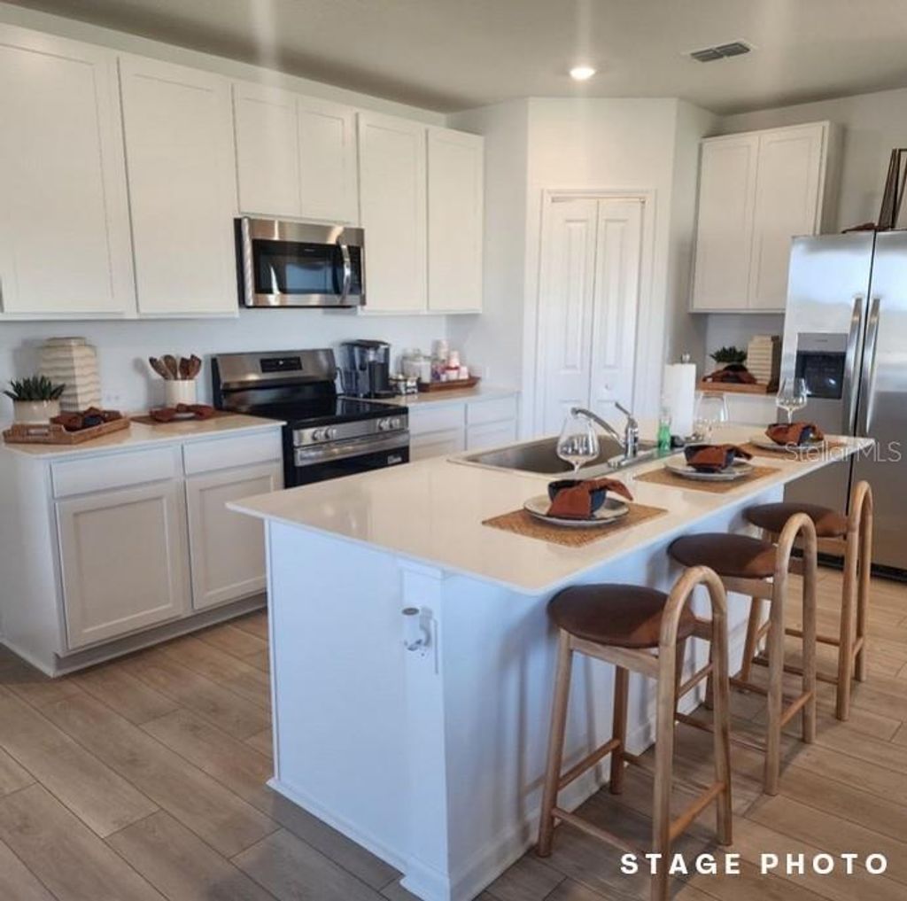 Photo of 6432 Domizio Drive, Winter Haven, FL 33884 (MLS # O6376359)