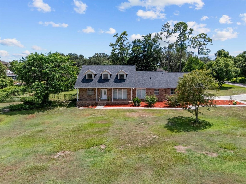 Photo of 1715 Lake Miriam Drive, Lakeland, FL 33813 (MLS # L4964257)