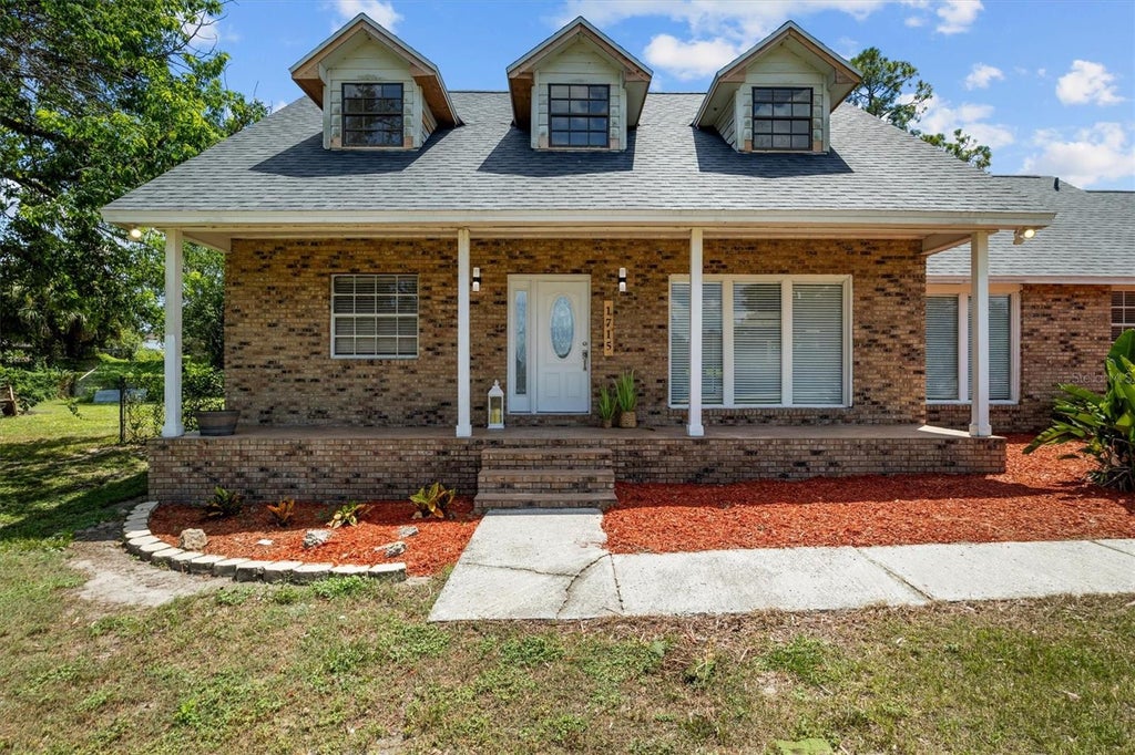 Photo of 1715 Lake Miriam Drive, Lakeland, FL 33813 (MLS # L4964257)