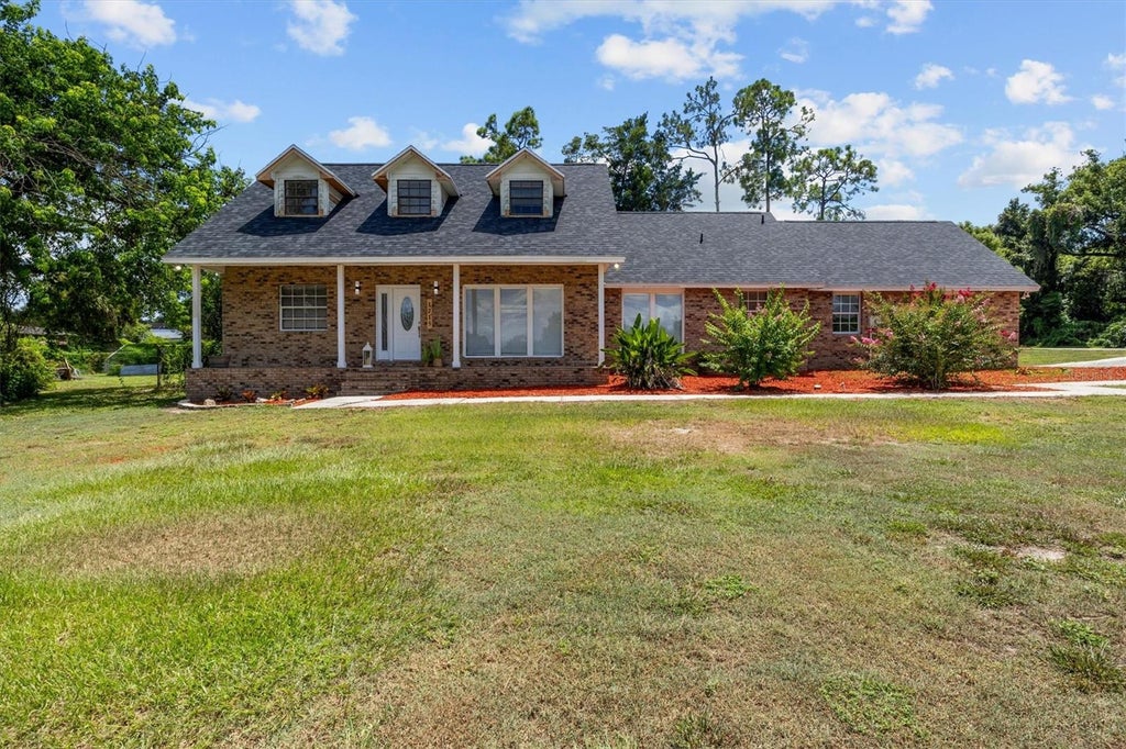 Photo of 1715 Lake Miriam Drive, Lakeland, FL 33813 (MLS # L4964257)