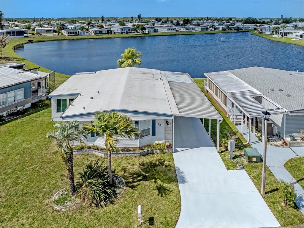Photo of 98 Lakeview Drive, North Port, FL 34287 (MLS # N6144056)