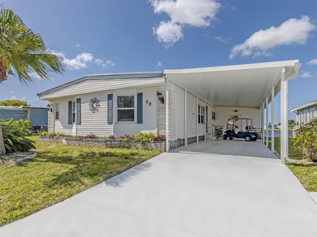 Photo of 98 Lakeview Drive, North Port, FL 34287 (MLS # N6144056)