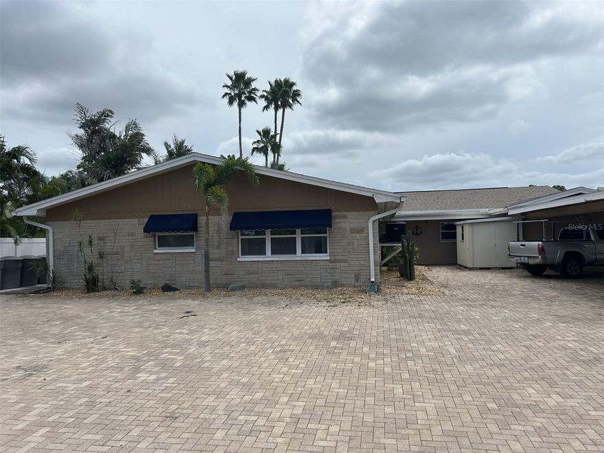 Welcome to your slice of paradise in this beautifully updated 2 bedroom, 1 bathroom front unit located in a charming 4-plex on Capri Isle in Treasure Island. Boasting over 1,100 square feet of stylish living space, this home offers the perfect blend of comfort, convenience, and coastal charm. Step inside to find a completely renovated kitchen featuring stainless steel appliances, granite countertops, and ample cabinetry—perfect for entertaining or cooking up your favorite meals. The modern tile flooring flows throughout the unit, and the updated bathroom adds a fresh, clean feel. Enjoy the Florida lifestyle with dock access for easy boat pick-up and drop-off, plus a shared backyard oasis complete with new turf and a putting green—ideal for relaxing or enjoying time with neighbors. Additional features include: On-site washer & dryer for tenant use, One assigned covered parking space, Pet-friendly (small dog allowed), Bikeable to the beach, restaurants, and local shops, Walkable to Roselli Park with tennis, pickleball, baseball, and basketball courts. Don't miss your chance to live in this peaceful, walkable waterfront neighborhood—schedule your showing today!