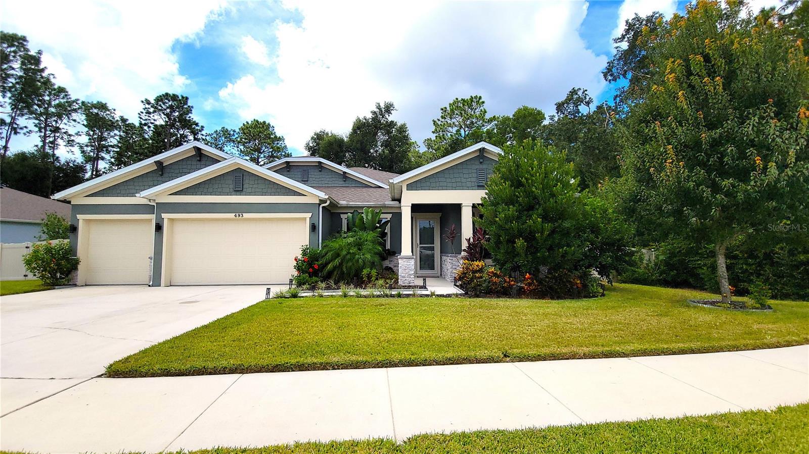 Huntington Downs Gem Welcome to a truly exceptional residence in the sought-after Emerald Line of DR HORTON the "Easton B model" in beautiful Huntington Downs. Show-Stopping Koi Pond that is supersized, A truly one of kind center piece that is something that you would see or find at a Disney theme park all under a screened lanai, that is a show stopper. This home is completely upgraded and surrounded by serene preserve land—offering unmatched privacy and natural beauty on 1/3 of an acre. Property Highlights: A Gourmet Kitchen with FARM SINK, Quartz countertops and REAL WOOD Cabinets.
Spacious Layout: Featuring a junior suite with walk-in closet and private bath, plus a secondary den and office with sleek epoxy flooring.
3-Car Garage: Includes smart lighting, two smart garage door openers (ADT app compatible), attic access via stairs in garage and primary closet.
Energy Efficient: Solar panels capable of powering the entire home (to be paid off with a strong offer), tankless water heater, water softener, Energy Star windows, and reclaimed water sprinkler system.
Hurricane-Ready: Impact-resistant CAT 4 hurricane windows for peace of mind.
Connectivity: Fiber and cable utilities already in place Unique Features
Food Forest Paradise: Enjoy a bounty of edible plants including mangoes, avocados (Brogdon & Hass), papaya, lychee, fig, dragon fruit, pineapple, grapes, blackberry, strawberry tree, sweet potatoes, bananas, and more.
Pollinator-Friendly Landscaping: Local flowering bushes attract butterflies and bees, enhancing the garden’s vitality
Fenced Yard: Vinyl fencing on the sides and aluminum fencing at the rear for unobstructed views of the preserve.
Smart Home Features: Solar Edge app for monitoring energy usage, smart garage access, and exterior lighting, Additional Amenities.
Pest control service by Heron every 3 months.
Gutter system installed post-construction.