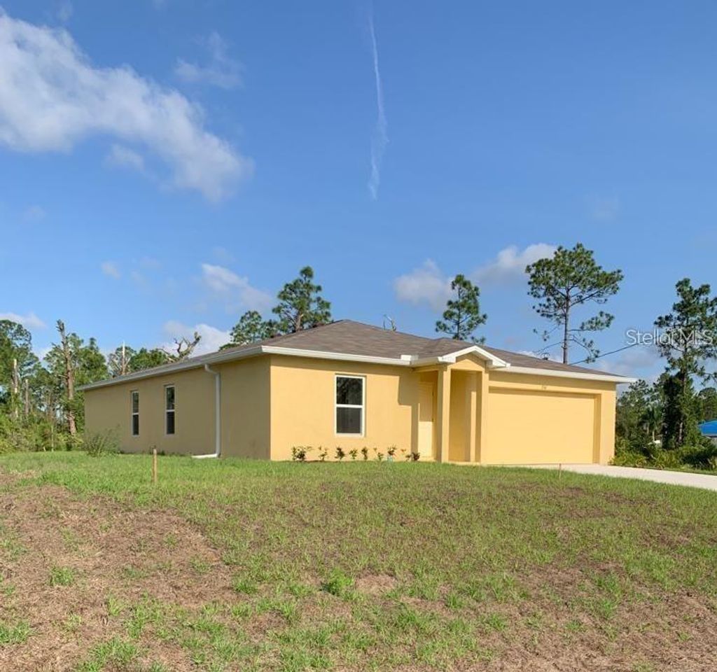 Photo of 354 Western Avenue S, Lehigh Acres, FL 33974 (MLS # C7516937)