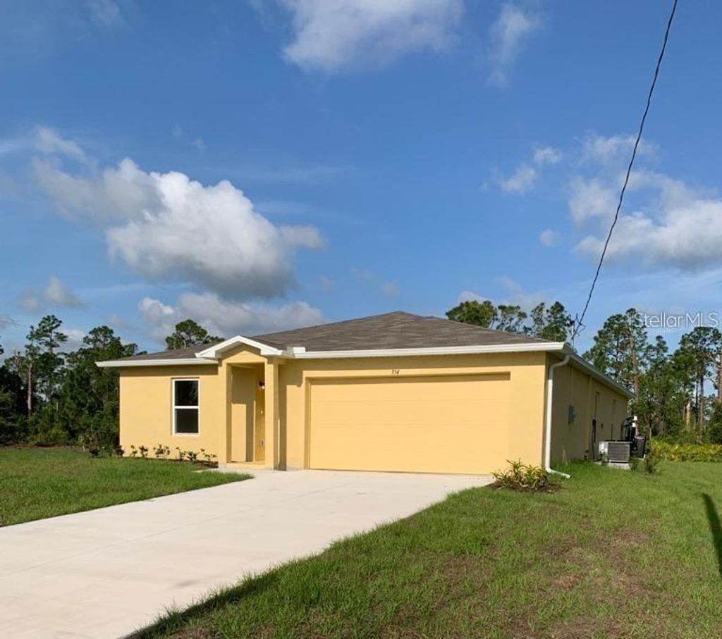 Photo of 354 Western Avenue S, Lehigh Acres, FL 33974 (MLS # C7516937)