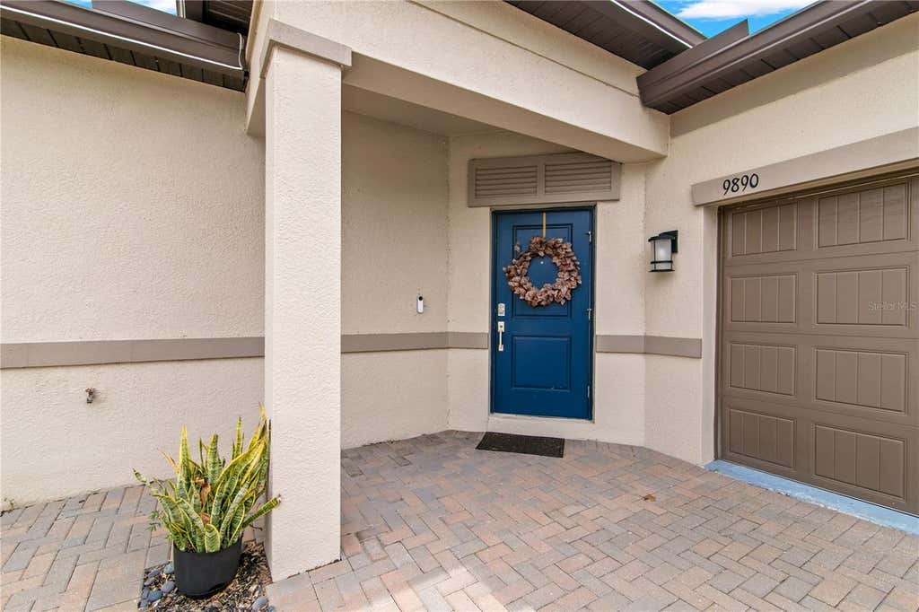 Photo of 9890 Red Bay Loop, Land O Lakes, FL 34637 (MLS # TB8518654)