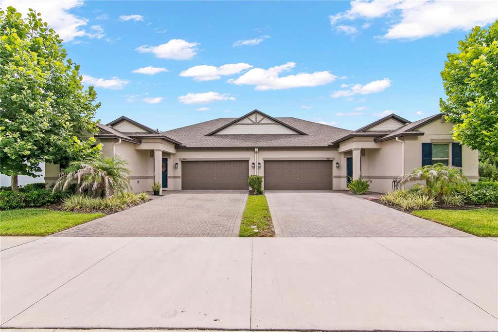 Photo of 9890 Red Bay Loop, Land O Lakes, FL 34637 (MLS # TB8518654)