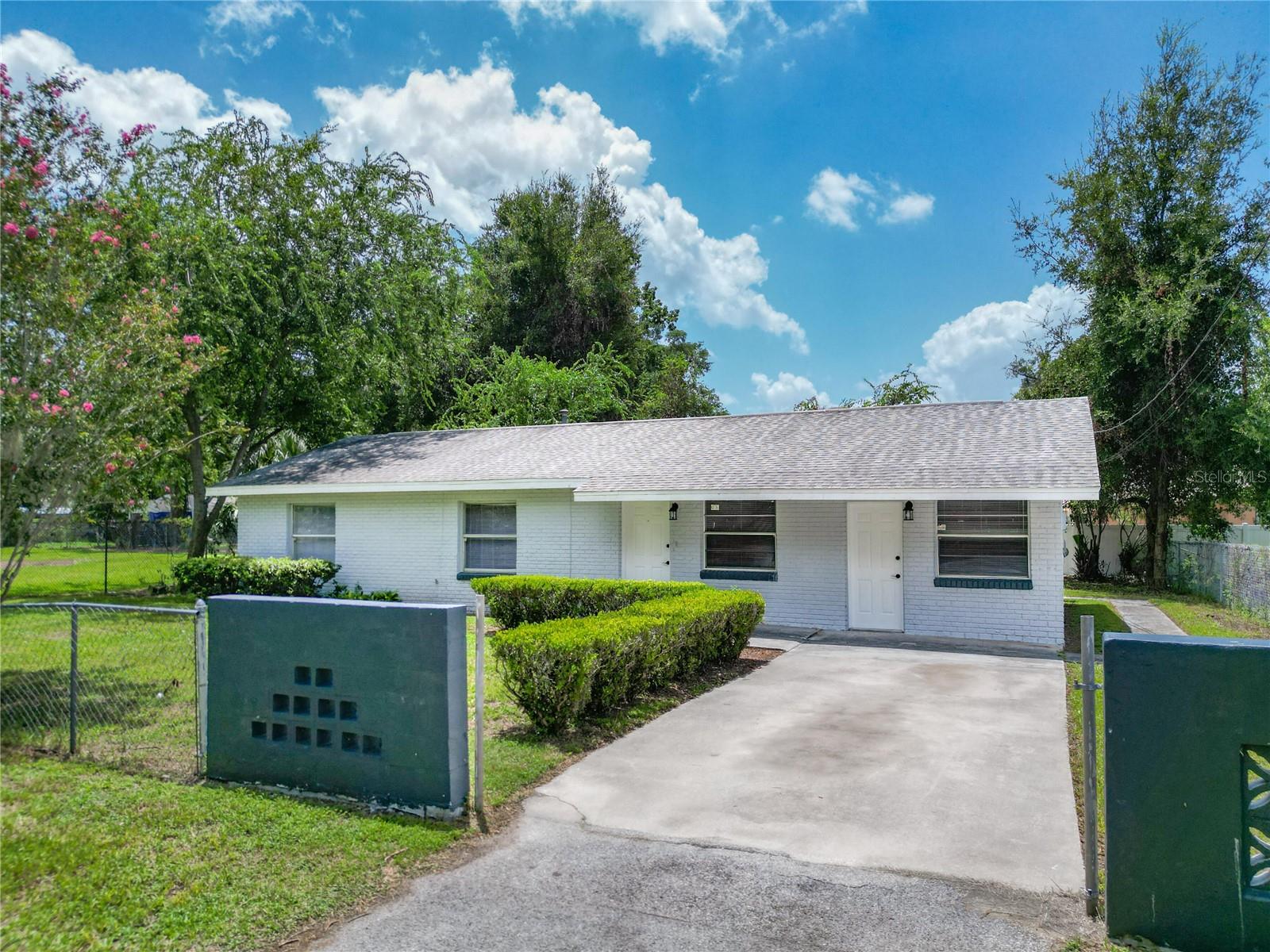 One or more photo(s) has been virtually staged. Welcome, Virtually staged. Welcome to this FRESHLY RENOVATED, charming home in a prime Ocala Location! Just minutes away to Downtown, main streets, Walmart, parks, restaurants, shopping and entertainment, and schools. This CBS 3 bedrooms two bathrooms property is situated in a quiet neighborhood on a spacious corner of 0.18 acre lot ! This spacious property features a bonus huge room that could be used as an office space or for any kind of necessity. There are tons of upgrades including NEW kitchen with Quartz countertops, refurbished cabinets, NEW stainless steel appliances, NEW bathroom with Luxury tile shower, Freshly Painted Interior and exterior, NEW Luxury Vinyl Plank bedroom flooring, NEW doors, NEW fixtures and Ceiling Fans, etc. You even have a laundry room ! Don’t miss out on the chance to call this gem your own.