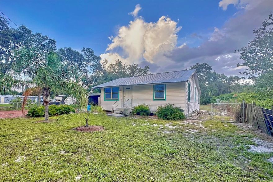 This gem is back on the market!  MOTIVATED SELLER! Welcome to this cozy and bright 2-bedroom, 1.5-bath home tucked away in the peaceful countryside of Frostproof. With 672 sq ft of open living space and laminate flooring throughout, this home offers a warm and inviting atmosphere. Enjoy plenty of natural light thanks to multiple windows in every room, creating a bright and airy feel throughout. The kitchen comes fully equipped with an oven, refrigerator, dishwasher, and there’s a separate room for laundry with a washer and dryer for added convenience. Sitting on a 0.26-acre lot, the property features a huge backyard, two storage sheds, and ample room to relax, garden, or expand.
This charming property offers endless possibilities to personalize—perfect for a first-time home buyer, investor, downsizer, or even someone looking for a weekend retreat. Located just a quarter mile from US 98, less than 1.5 hours from Disney World, and close to Lake Clinch and Reedy Lake, it offers the ideal balance of rural charm and accessibility. Don’t miss this opportunity to make it your own—all at an unbeatable price of $129,000!