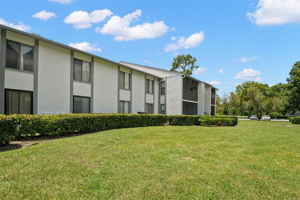 Photo of 1151 Pine Ridge Circle W #C1, Tarpon Springs, FL 34688 (MLS # TB8406413)