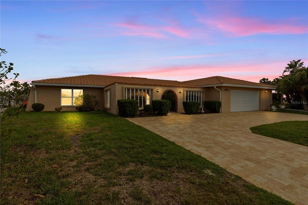 Photo of 4964 South Shore Drive, New Port Richey, FL 34652 (MLS # TB8485129)