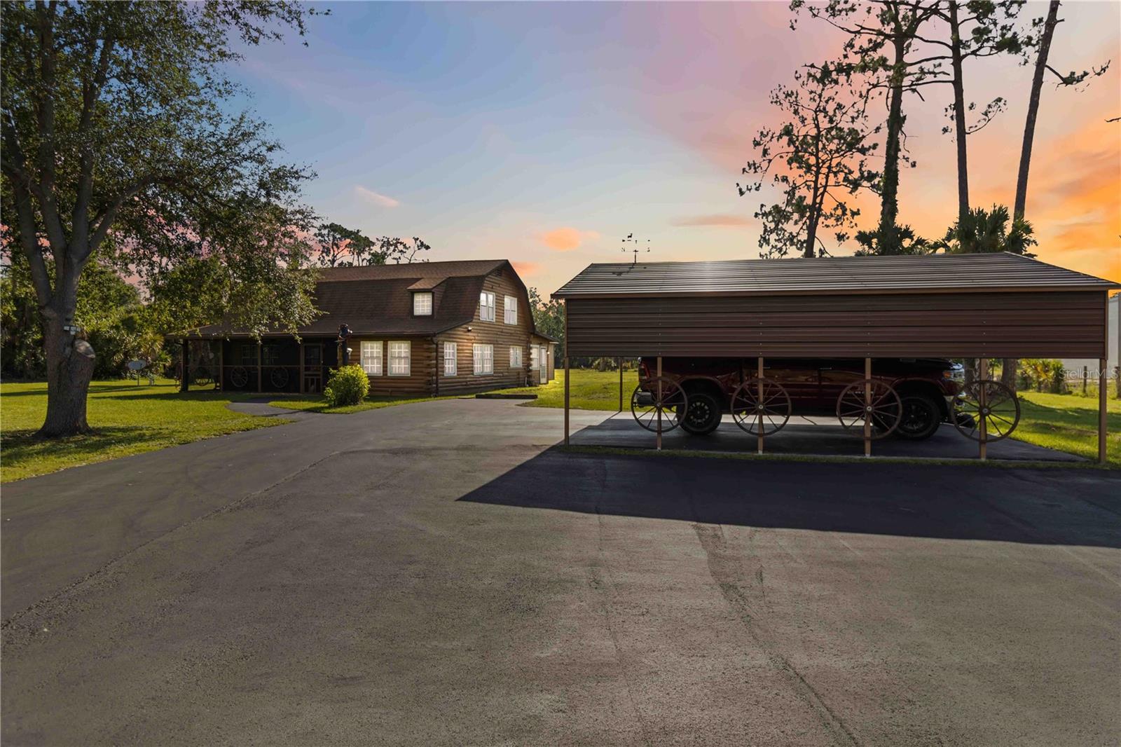 Short Sale. SHORT SALE OPPORTUNITY!
Rustic Charm with Modern Amenities on Over 3 Acres!
Welcome to 6762 Tidwell Street, a beautifully maintained log cabin-style residence offering the perfect blend of peace, privacy, and practicality in North Port. Set on 3+ acres with fence, this unique 4-bedroom home is loaded with upgrades and ideal for those seeking space, comfort, and self-sufficiency.
Step inside and fall in love with the warmth of solid wood construction, a wood stove fireplace with blower, and a versatile attached recreational room—perfect for a home theater, gym, or game room.
Key Features Include:
4 bedrooms with spacious living areas
Newer roof, impact windows, and 2 A/C systems
Generac house generator with 100-gallon propane tank for reliable backup power
Propane stove for gourmet cooking
Newer hot tub for relaxing under the stars
26x22 covered carport—great for trucks, RVs, or outdoor gatherings
20x20 workshop with a boat bay—ideal for hobbyists or marine enthusiasts
Fenced acreage—perfect for pets HORSES WELCOME!, gardening, or adding additional structures
This property is a rare find—offering the charm of rural living with the convenience of nearby North Port amenities. Whether you're looking for a private homestead, a hobby farm, or a family retreat, 6762 Tidwell Street is ready to welcome you home.
Schedule your private showing today—this one won’t last!
